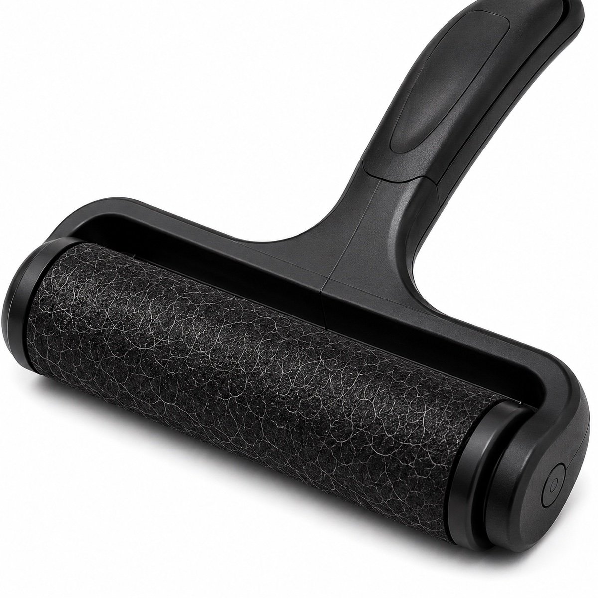 Macro close-up of the pet hair remover showing the handle and roller surface
